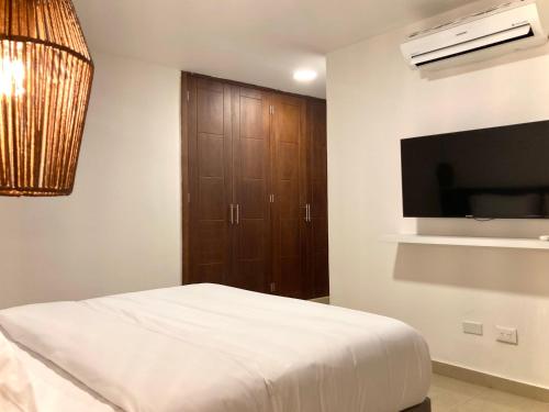 TV a/nebo společenská místnost v ubytování Bocagrande Comfort Stays