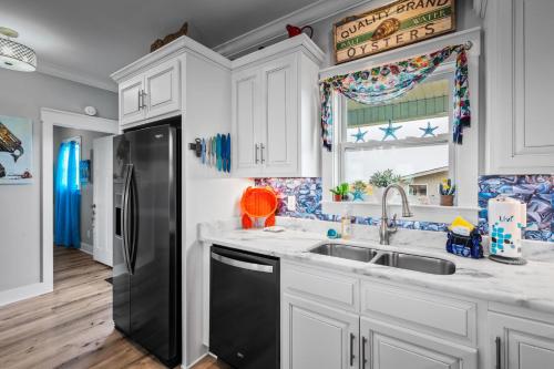 Kuchyň nebo kuchyňský kout v ubytování 050 Lifes A Beach