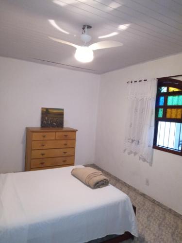 Ένα ή περισσότερα κρεβάτια σε δωμάτιο στο Casa de Praia em Jaconé - Centro de Jacone - Comércios e Mercado!