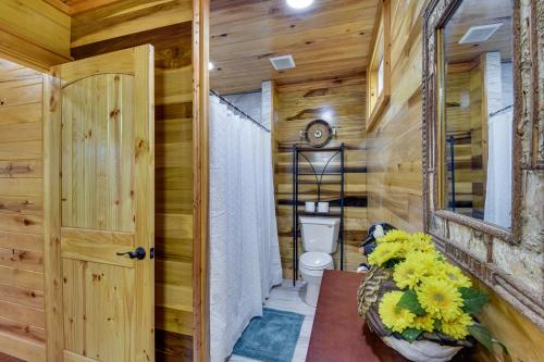 a bathroom with a toilet and a sink at Mountain-View Cabin about 2 Mi to Downtown Clayton! in Clayton