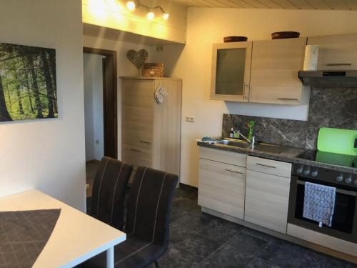 Kuchyň nebo kuchyňský kout v ubytování Apartment Rosi SECONDO