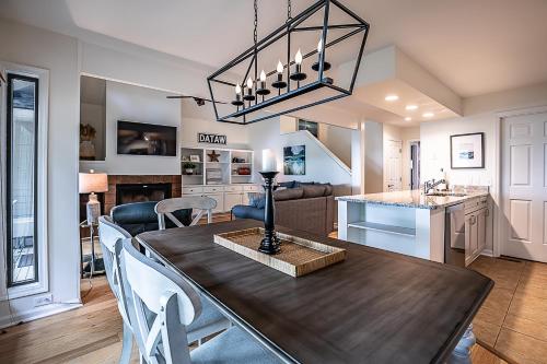 a dining room and kitchen with a table and chairs at NEW Listing! Bluff Villa on Dataw in Dataw Island