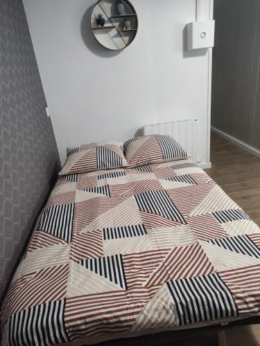Postel nebo postele na pokoji v ubytování Bienvenue chez Coco