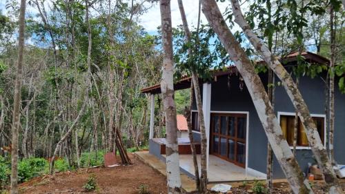 a house in the middle of the forest at Chalés Pura Vida in Itacaré