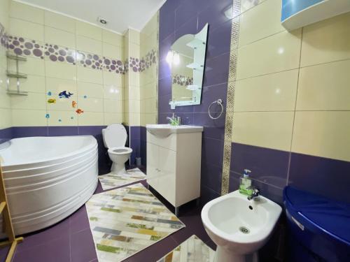 Koupelna v ubytování RentForComfort Charming Flat in Bistrita