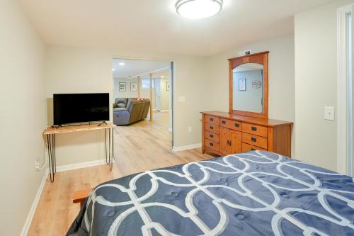 a bedroom with a bed and a flat screen tv at Family-Friendly Blacksburg Retreat with Playground! in Blacksburg