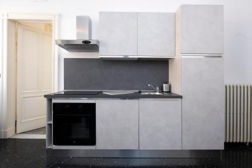 Kuchyň nebo kuchyňský kout v ubytování 236 - Casa Corso Colombo - Centro Storico, Mare e spiaggia a 200m - PARCHEGGIO GRATIS INCLUSO