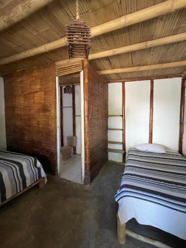 Cama o camas de una habitación en Naif habitaciones