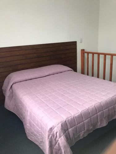 Tempat tidur dalam kamar di Casa Isabel