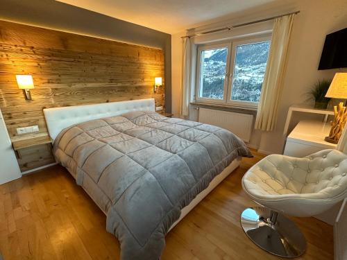 Säng eller sängar i ett rum på Ferienhaus Freizeit