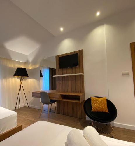 Ένα ή περισσότερα κρεβάτια σε δωμάτιο στο Hotel Comfort & Villas