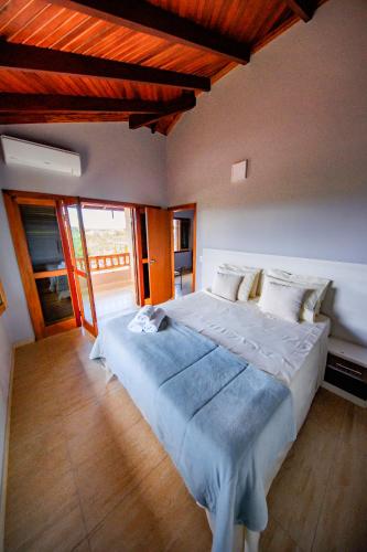 Ένα ή περισσότερα κρεβάτια σε δωμάτιο στο Villa Annapurna