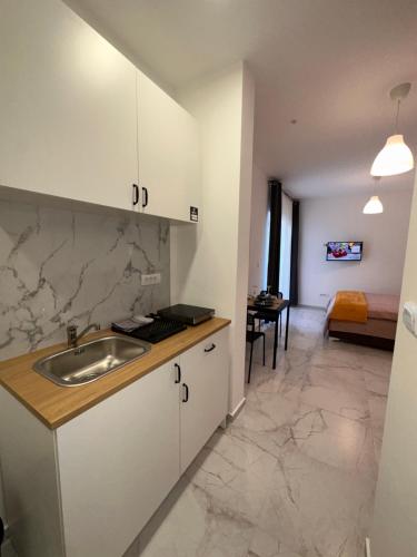 Kuchyň nebo kuchyňský kout v ubytování Residence Spa Apartments DUB