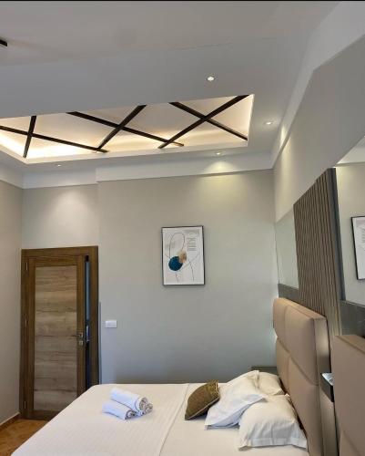 Ένα ή περισσότερα κρεβάτια σε δωμάτιο στο Hotel Comfort & Villas