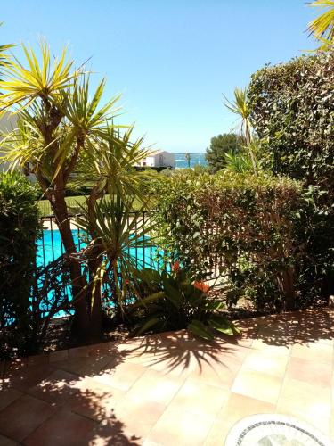 T2 DANS DOMAINE PRIVE PISCINE TENNIS PARC PARC AQUATIQUE VUE MER ET PLAGE