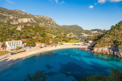 an aerial view of a beach with mountains at Villa Theodora in Nisakion