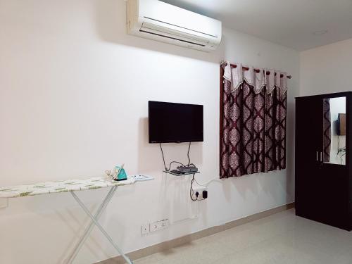 Μια τηλεόραση ή/και κέντρο ψυχαγωγίας στο Ramya Residency Porur