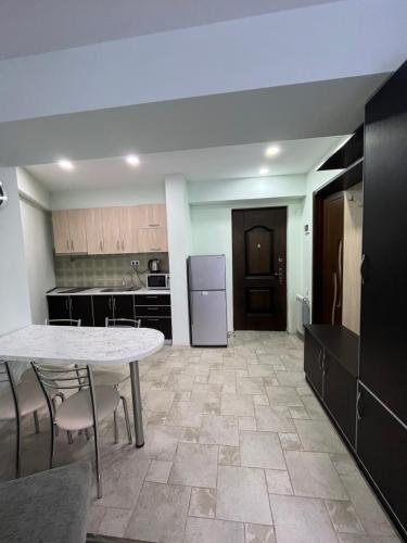 Η κουζίνα ή μικρή κουζίνα στο Gudauri Palace apartments in New Gudauri