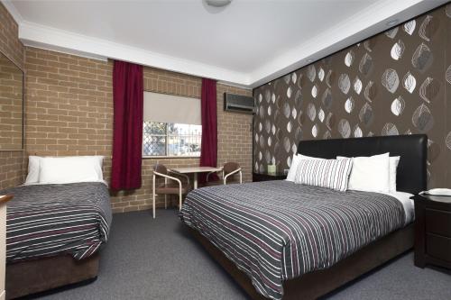 Легло или легла в стая в Grand Manor Motor Inn