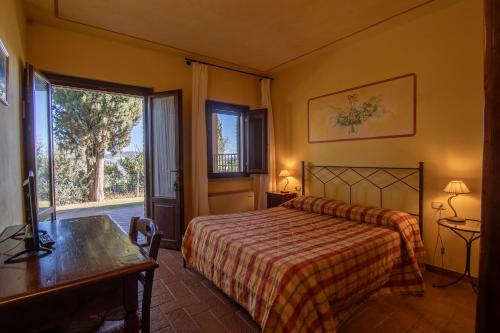 Postel nebo postele na pokoji v ubytování Agriturismo Buratta