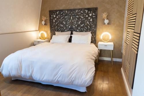 Ένα ή περισσότερα κρεβάτια σε δωμάτιο στο L'étoile d'Arras