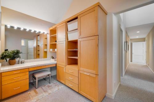 a large bathroom with a sink and a mirror at Harbor Haven in Santa Cruz