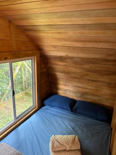 Katil atau katil-katil dalam bilik di Glamping Cabanas do Estaleiro