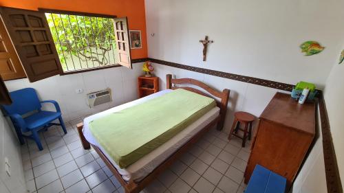 Ένα ή περισσότερα κρεβάτια σε δωμάτιο στο Cantinho da Ilha