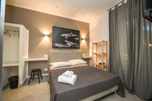 A bed or beds in a room at Living Salerno B&b