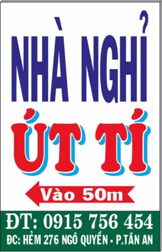 a sign for a new u try with at Nhà nghỉ Út Tí in Tân Tạo