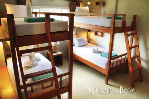 Postel nebo postele na pokoji v ubytování Phangan Pearl Villa
