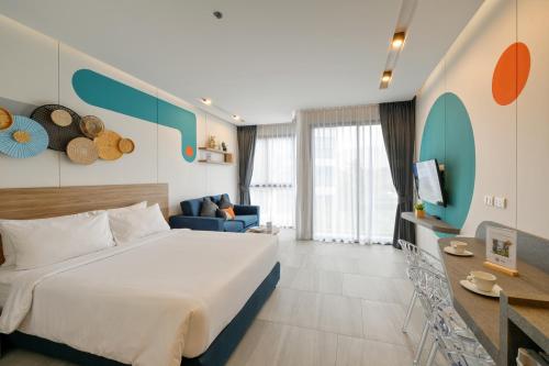 Cama o camas de una habitación en HOMA Phuket Town