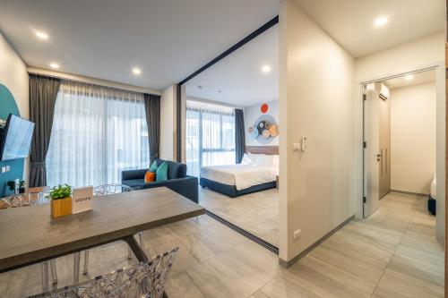 Cama o camas de una habitación en HOMA Phuket Town