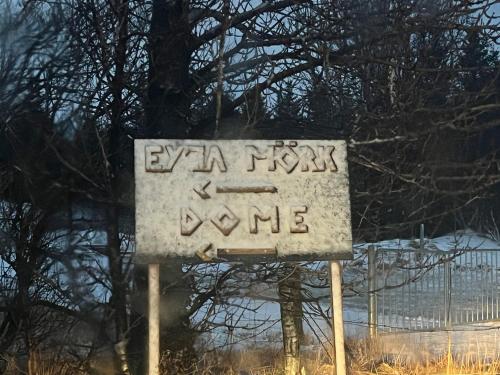 a sign that says eva rocks and xoxo at Eyja Mork - Aurora Dome with Private Bathroom and other facilities in Hvolsvöllur