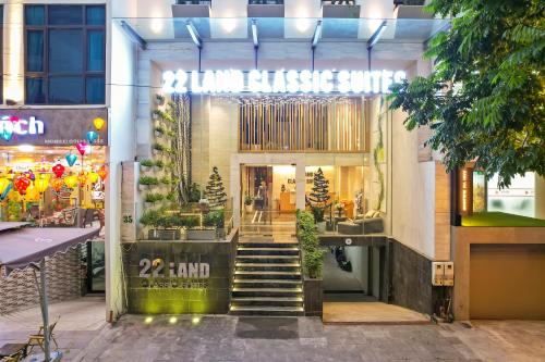 a store front with stairs leading into a store at 22Land Classic Suites in Hanoi