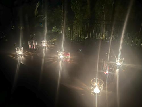a group of lights on a street at night at SylVan Resort in Wayanad