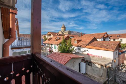 a view of a city from a balcony at Guesthouse Mtskheta-Kapanadze in Mtskheta