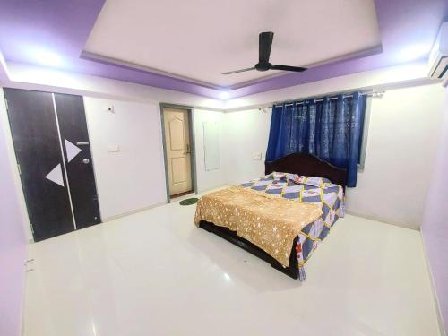 En eller flere senge i et værelse på Namaste Nirvana Shanti Villa