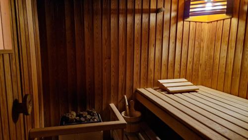 a corner of a room with a sauna at Chesa Bellaval, Haus la Vuolp 2 1 2 Zimmerwohnung in Silvaplana