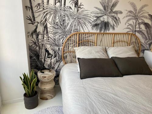 Postel nebo postele na pokoji v ubytování Appartement cosy, Gare 5 minutes et Home cinéma