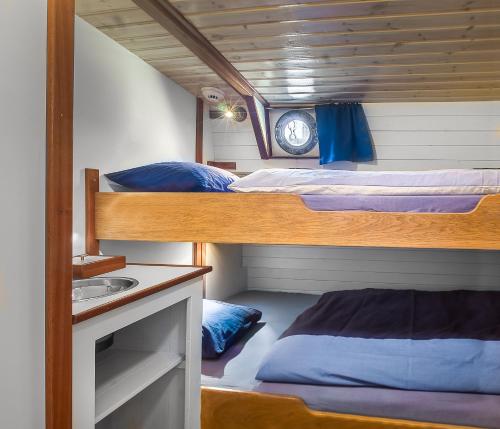 Poschodová posteľ alebo postele v izbe v ubytovaní De Onderneming