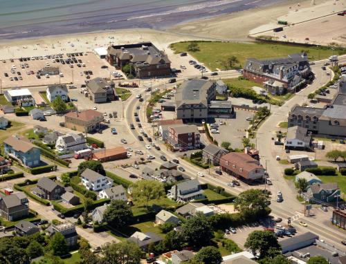an aerial view of a city with a beach at Rhea's Inn by the Sea in Middletown