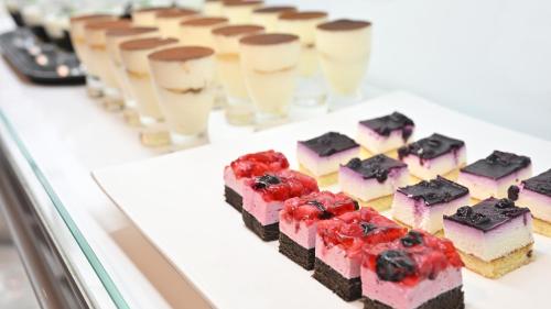 a row of desserts on a white table at Miharashinoyado Fronden in Hita