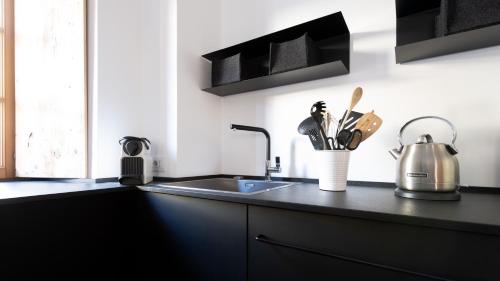 Cucina o angolo cottura di Bear Hutte - Bormio & Livigno luxury stay