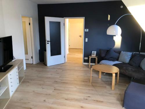 En sittgrupp på Stilvolle helle Wohnung im Zentrum