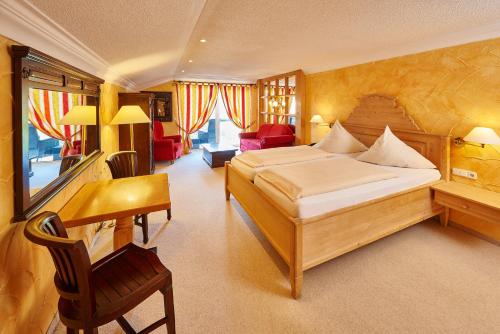 Postel nebo postele na pokoji v ubytování Naturhotel Rebling