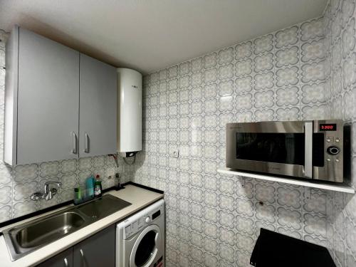 Kuchyňa alebo kuchynka v ubytovaní Amplio apartamento familiar con parking privado en pleno centro de Córdoba