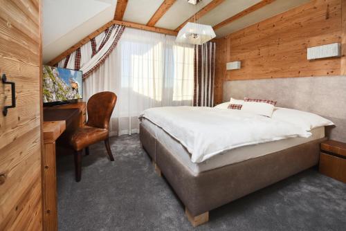 Ένα ή περισσότερα κρεβάτια σε δωμάτιο στο APLEND Hotel Kukučka