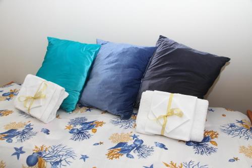 En eller flere senge i et værelse på Il Principe di Napoli