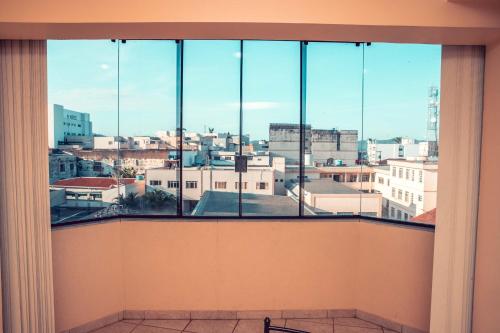 a view of a city from a window at STALO HOTEL in Piumhi
